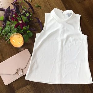 White sleeveless top